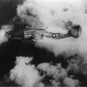 US Air Force B-24 Liberator Bomber Goes Down in Flames in a Raid Over Austria (L. S. Stoutsenberger)