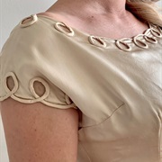 Looped Piping Detail on Neck, Sleeves