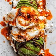 Poppy Seed Sourdough Bread With a Poached Egg and Sweet Chili Sauce