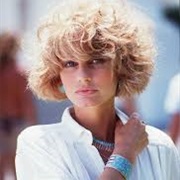 Jill Ireland as Marcia (Breakout Pass)