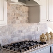Natural Stone Tiles Backsplash in Kitchen