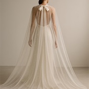 Cape With Bow Tied at Back of Neck