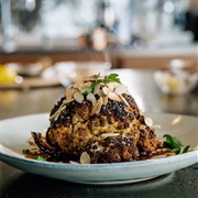 Whole Roasted Cauliflower With Almond and Caper Burnt Butter