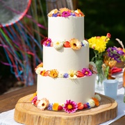 Flowers Around Each Tier of Cake
