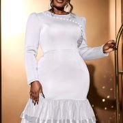 Rounded Line of Buttons Across Bodice