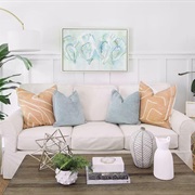 Mix of Patterned and Solid Pillows in Living Room