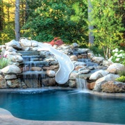 Outdoor Swimming Pool With Waterfall Slide