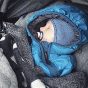 Babies Sleeping in Stroller Outdoors