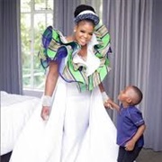 Large Ruffle Tiers Around Shoulders