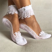 Bride Wearing Socks Without Shoes