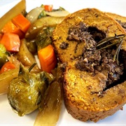 Roasted Seitan With Stuffed Mushrooms and Mixed Nuts