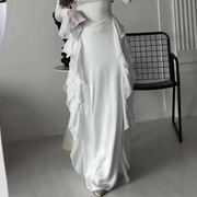 Cascading Ruffles From Both Hips