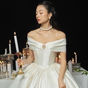 Brooch in Middle of Neckline on Bodice