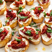 Goat Cheese and Tomato Tapenade Crostini