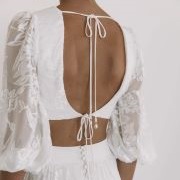 Double Ties Across Open Back of Dress
