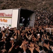 Kurdish Refugees From North Iraq Mob a Food Aid Truck at Iskiveren Refugee Camp (Roger Hutchings)