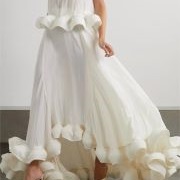 Small, Wave-Like Ruffles on Dress