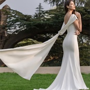 Back Draping With Flowing Cape-Like Piece