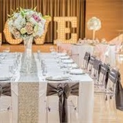Fabric Bows on Chairs at Wedding