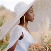 Wide-Brimmed Hat With Wedding Dress