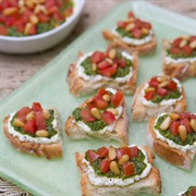 Goat Cheese, Pesto and Tomato Crostini