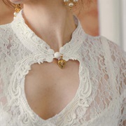 Keyhole With Dangling Charm