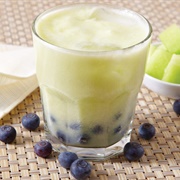 Honeydew Boba Tea With Huckleberry Boba