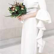 Cascading Ruffles From Sleeves