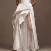 Asymmetrical Pickups Around Skirt Opening