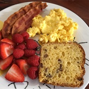 Pistachio Matcha Panettone With Scrambled Eggs and Parmesan