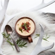 Reindeer Meat Stew Cooked Over a Fire