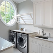 Laundry Room With Sink, Cabinets, Counter
