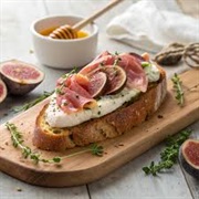 Fig, Honey, Burrata, and Prosciutto Toast