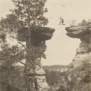 Ashley Bennett Leaping Across Stand Rock in Wisconsin Dells (Henry Hamilton Bennett)