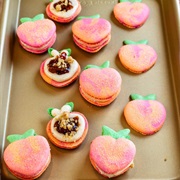 Peach Macaron With Peach Jam, Cinnamon Cream Cheese Frosting, and Streusel