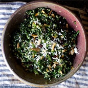 Kale With Pomegranate Dressing and Ricotta Salata