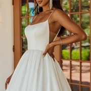 Low-Cut Armholes on Sides of Dress