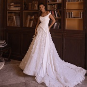 Bodice Ruching Flows to Side Drape Over the Skirt