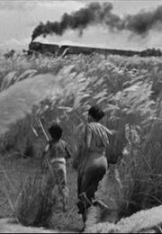 Children Watching the Train Pass by in Pather Panchali (1955)