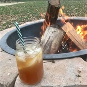 Drink Apple Cider at a Bonfire