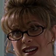 Tonie Perensky as Miss Davis (Varsity Blues)