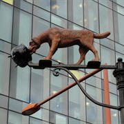 Dog and Pot Sculpture