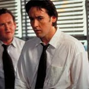 John Cusack as Soecial Agent Vince Larkin Con Air)
