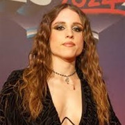 Angelina Mango (LGBTQ+, She/Her)