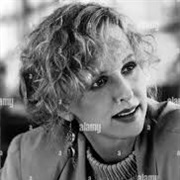 Kim Greist as Beth ( Throw Moma From the Train)