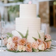 Flowers Around Bottom of Cake Only