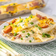 Potato Jalapeño Cheddar Pierogi and Marble Cheddar Casserole With Béchamel Sauce and Teriyaki Sauce