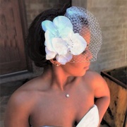Flower Headpiece With Birdcage Veil
