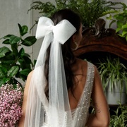 Bride Wearing Tulle Hair Bow