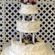 Cake With Visible Pillars Between Tiers